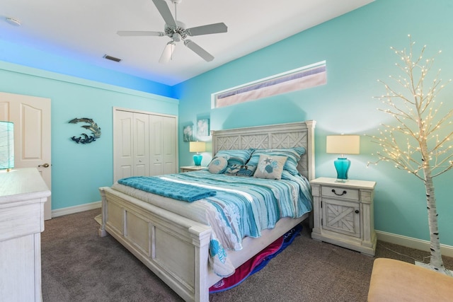 bedroom featuring ceiling fan, a closet, and dark colored carpet