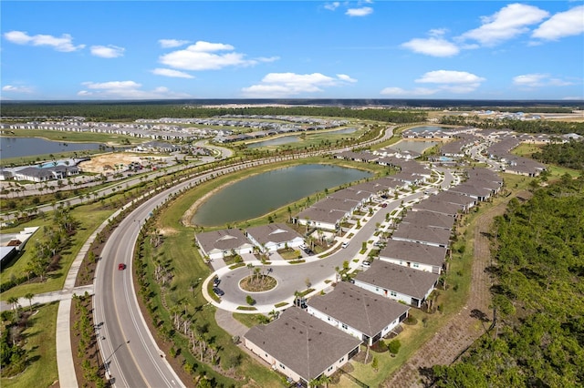 bird's eye view with a water view