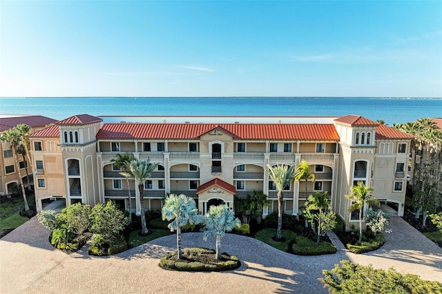 view of building exterior featuring a water view