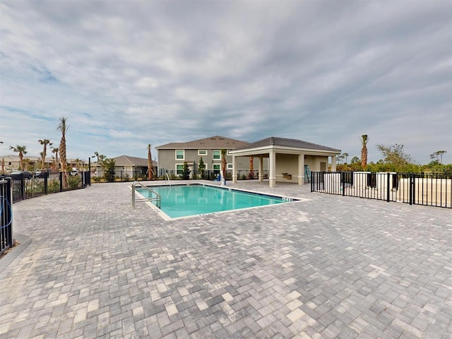 view of pool featuring a patio area