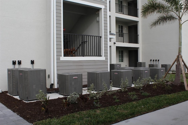 view of property with central air condition unit