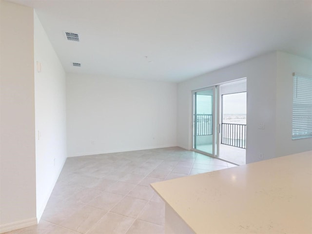 view of tiled spare room