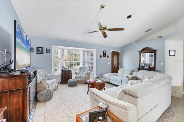 tiled living room with lofted ceiling and ceiling fan