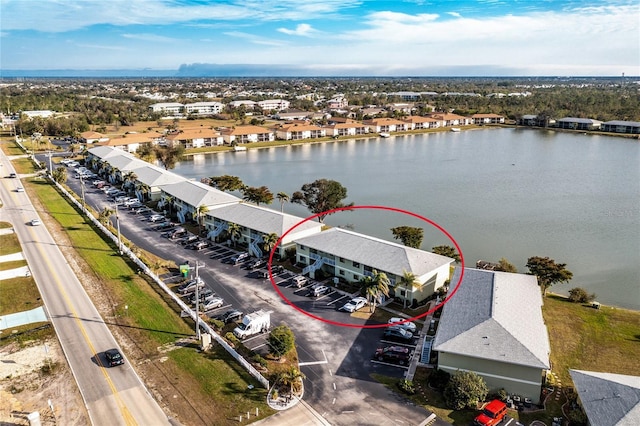 drone / aerial view featuring a water view