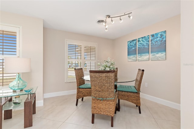 dining room featuring light tile patterned floors