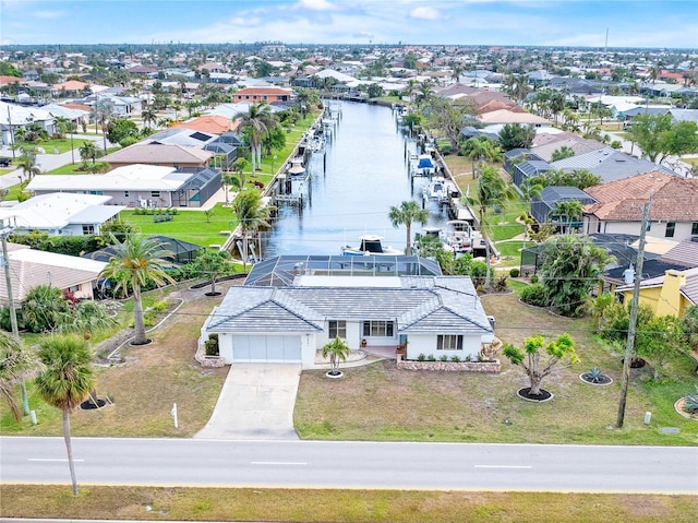 birds eye view of property featuring a water view