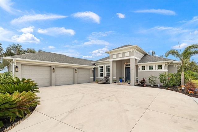 prairie-style house featuring a garage