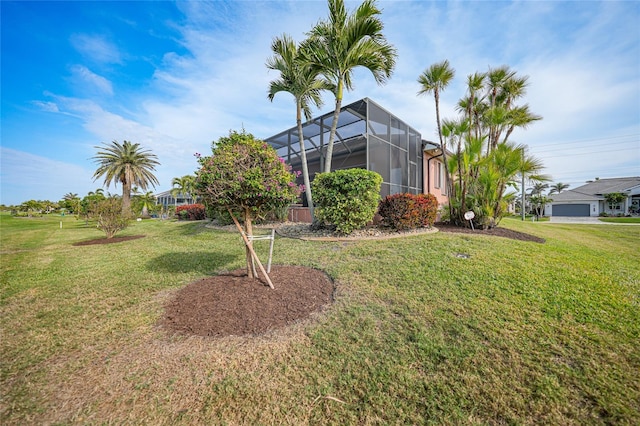 view of yard with a lanai