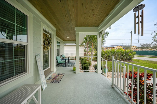 balcony featuring a porch