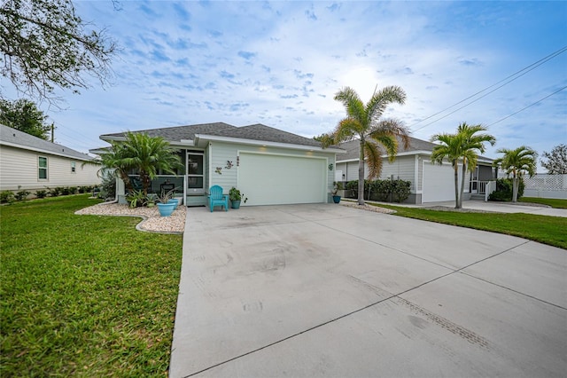 single story home featuring a garage and a front yard