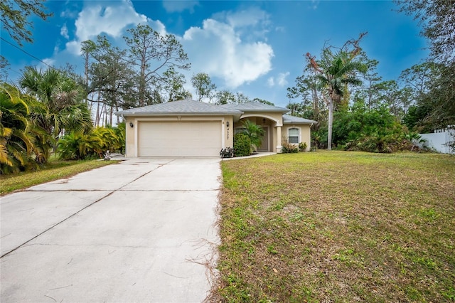 view of front facade featuring a garage and a front yard