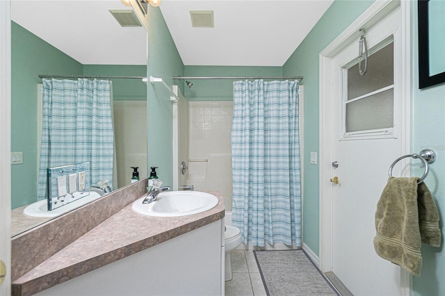 full bathroom featuring toilet, tile patterned flooring, shower / bath combo, and vanity