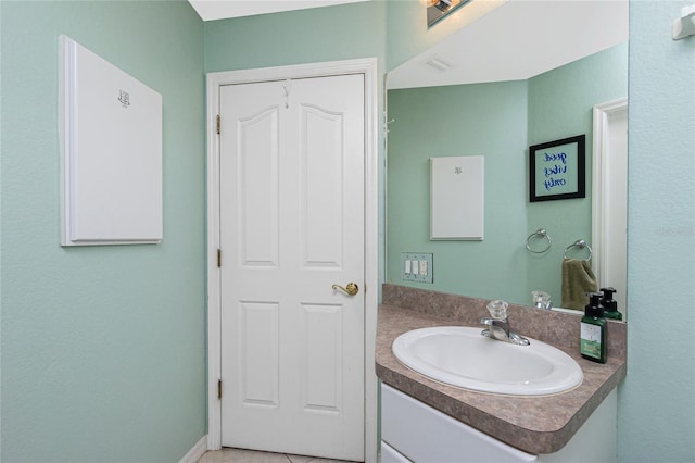 bathroom with vanity and tile patterned floors