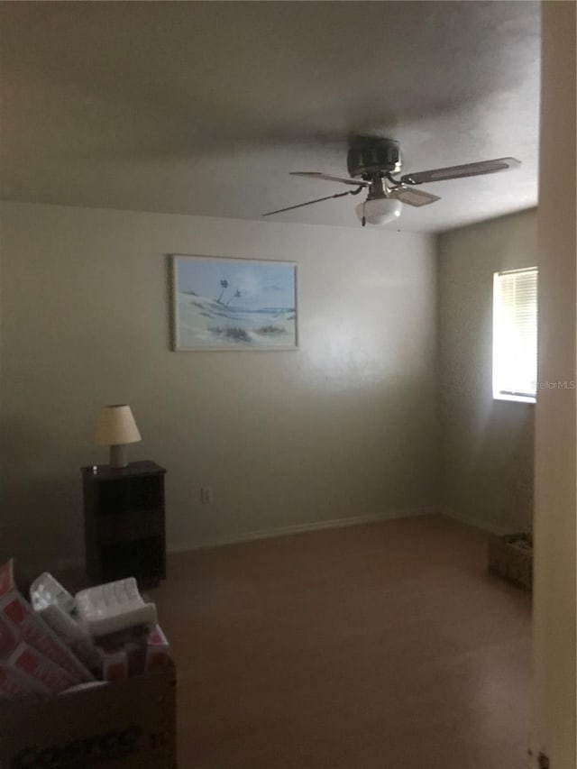 interior space featuring ceiling fan