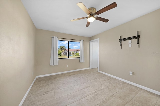 spare room featuring ceiling fan