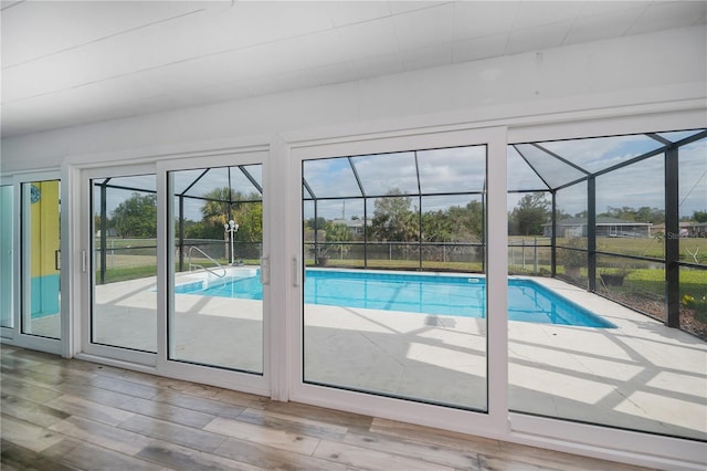 doorway to outside featuring hardwood / wood-style flooring