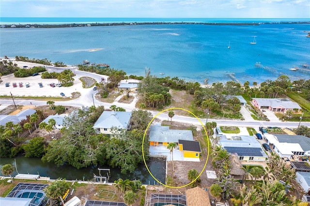 aerial view with a water view and a residential view