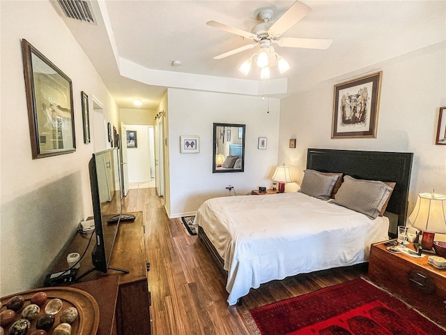 bedroom featuring ceiling fan and wood-type flooring