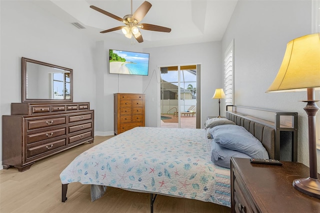 bedroom featuring ceiling fan, access to exterior, and light hardwood / wood-style floors