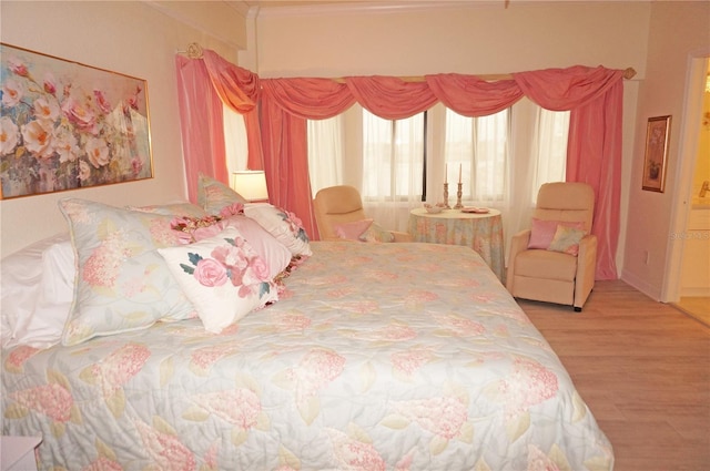 bedroom featuring light hardwood / wood-style flooring