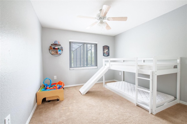 bedroom featuring ceiling fan and carpet flooring