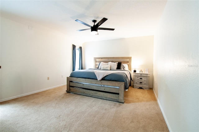 bedroom featuring ceiling fan and light colored carpet