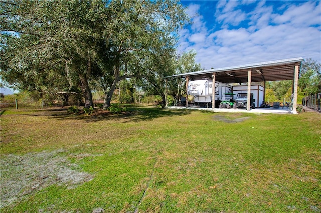 view of yard with a carport