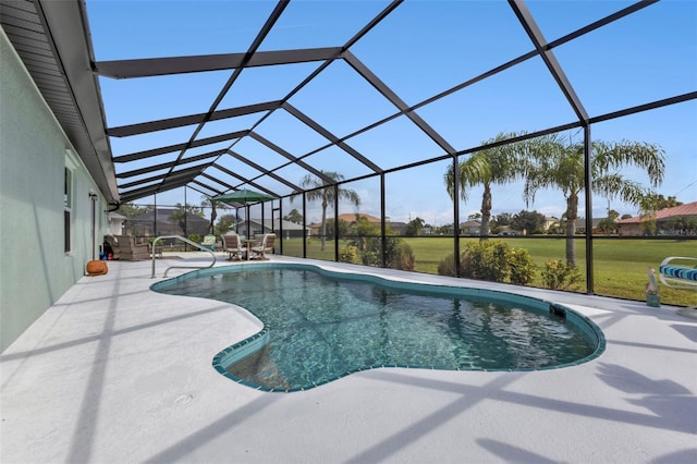 view of swimming pool with glass enclosure, a yard, and a patio