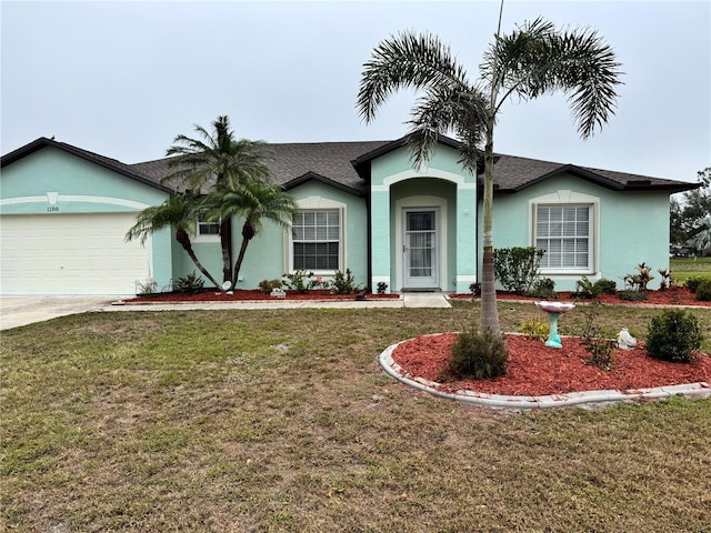 single story home with a front lawn and a garage