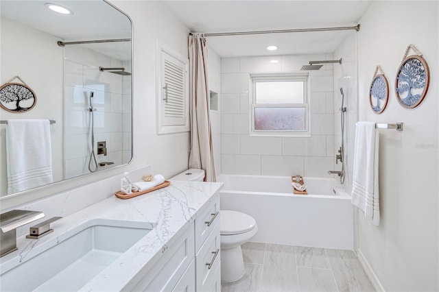 full bathroom with toilet, vanity, and shower / bath combo with shower curtain