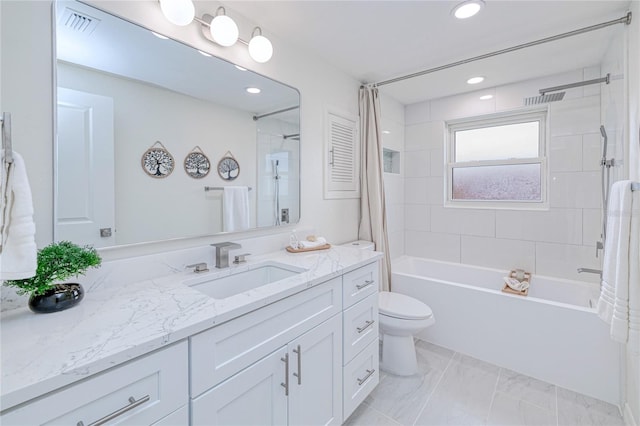 full bathroom with toilet, vanity, and shower / bath combo with shower curtain