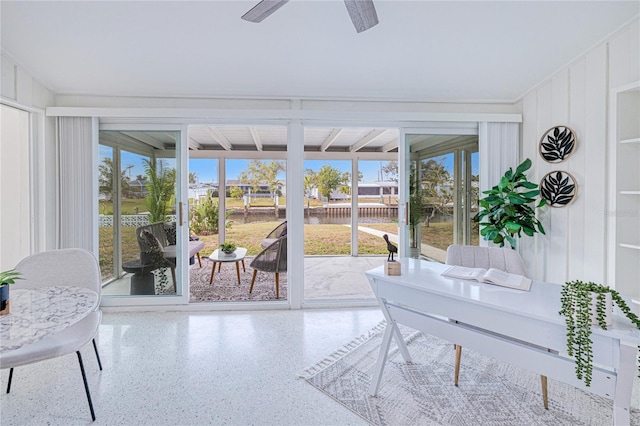 sunroom / solarium with ceiling fan