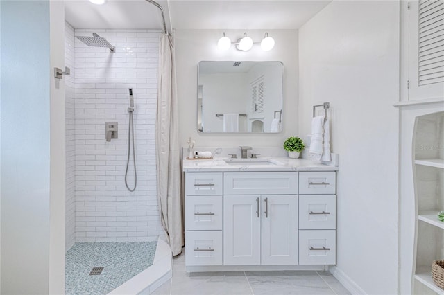 bathroom with curtained shower and vanity