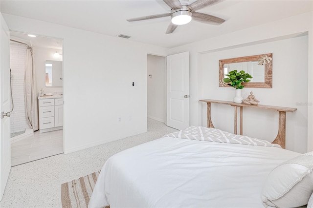 bedroom featuring ceiling fan and connected bathroom