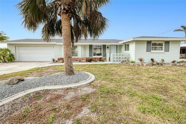 single story home with a front lawn and a garage