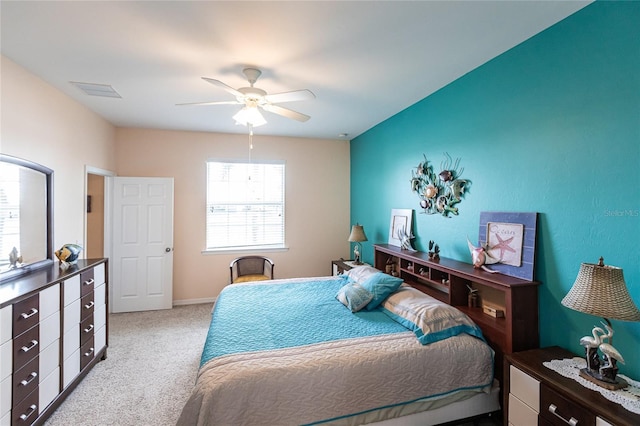 carpeted bedroom with ceiling fan