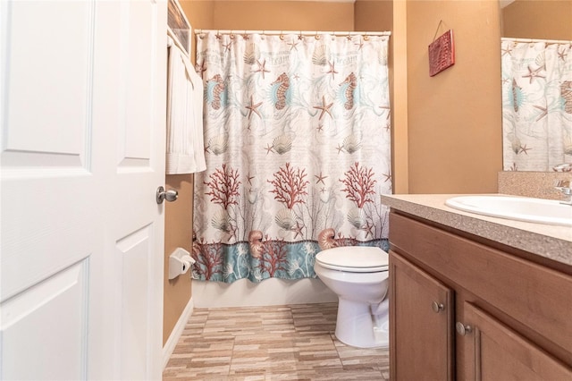 full bathroom with toilet, shower / tub combo, and vanity