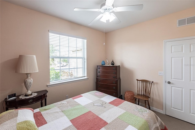 carpeted bedroom with ceiling fan