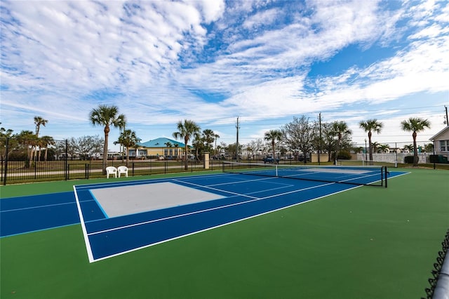 view of sport court with basketball hoop