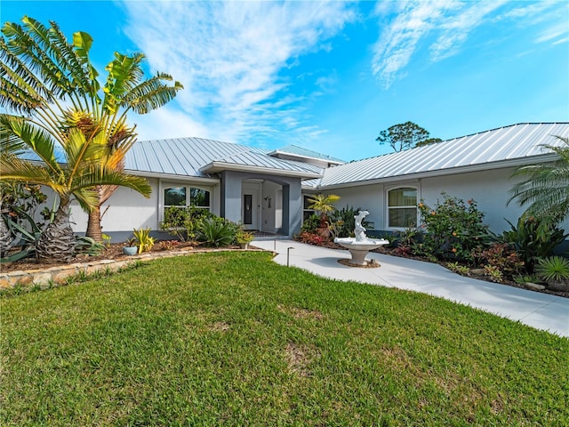 view of front of house featuring a front yard