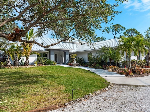 view of front of property with a front lawn