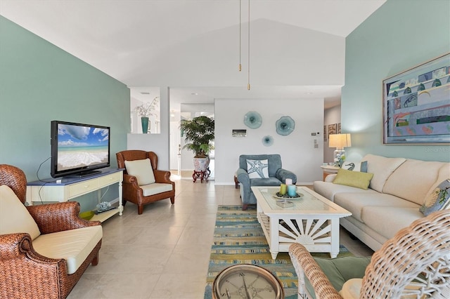 living room with light tile patterned floors and lofted ceiling