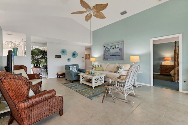 living room with vaulted ceiling and ceiling fan