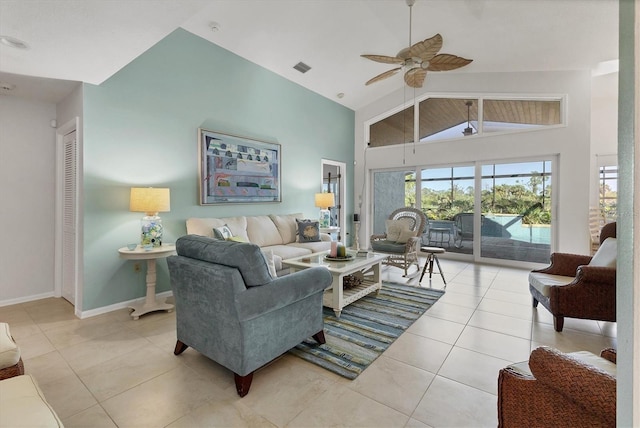 tiled living room featuring high vaulted ceiling and ceiling fan