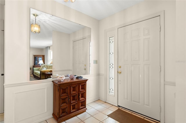 entrance foyer with light tile patterned flooring