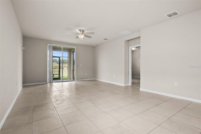 unfurnished room featuring ceiling fan and light tile patterned floors