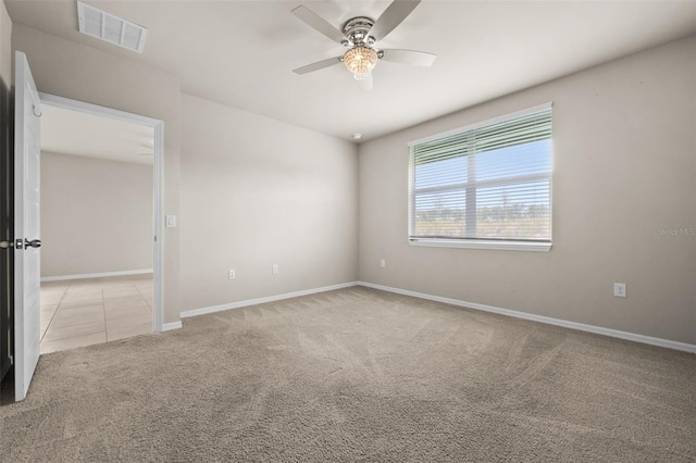 carpeted empty room with ceiling fan