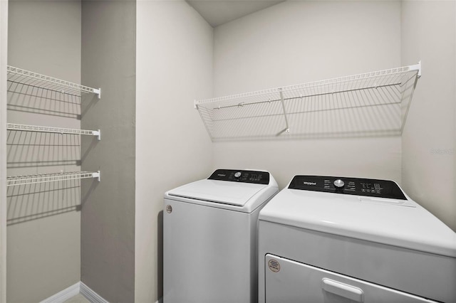 laundry area featuring washing machine and dryer