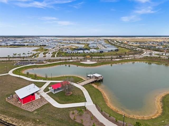 drone / aerial view with a water view