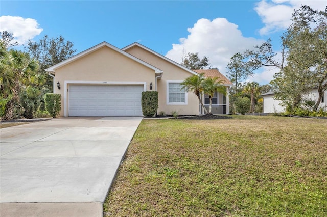 ranch-style house with a garage and a front yard